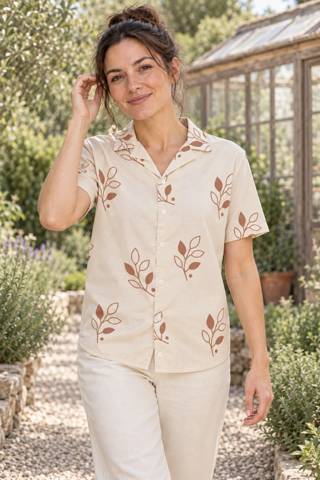 Clay Canopy in Sand, worn by a woman with large clay branches and white buttons.